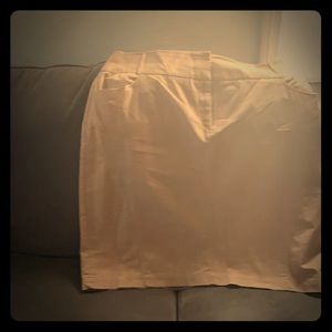 Cream color skirt w/belt loops.